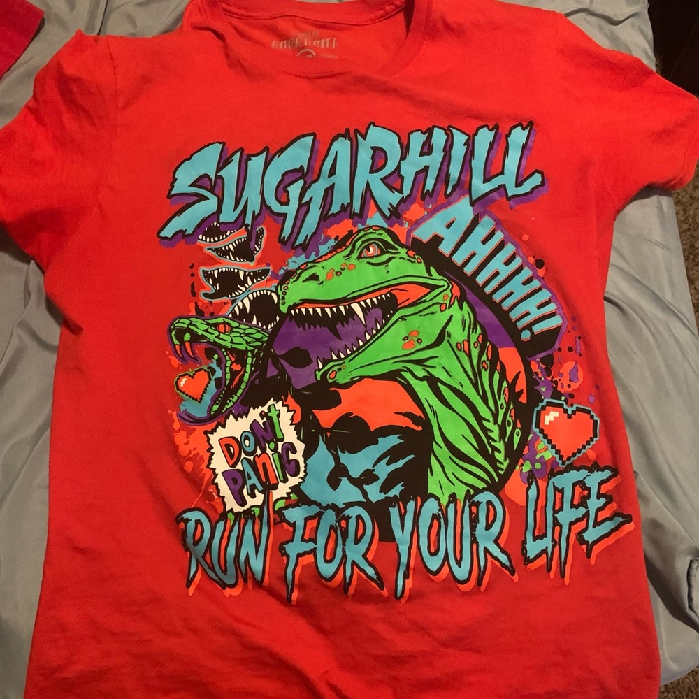 A red and colorful Sugarhill shirt